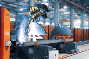 Why Robotic Welding Cells Are Becoming a Requirement for High-Volume Steel Building Projects